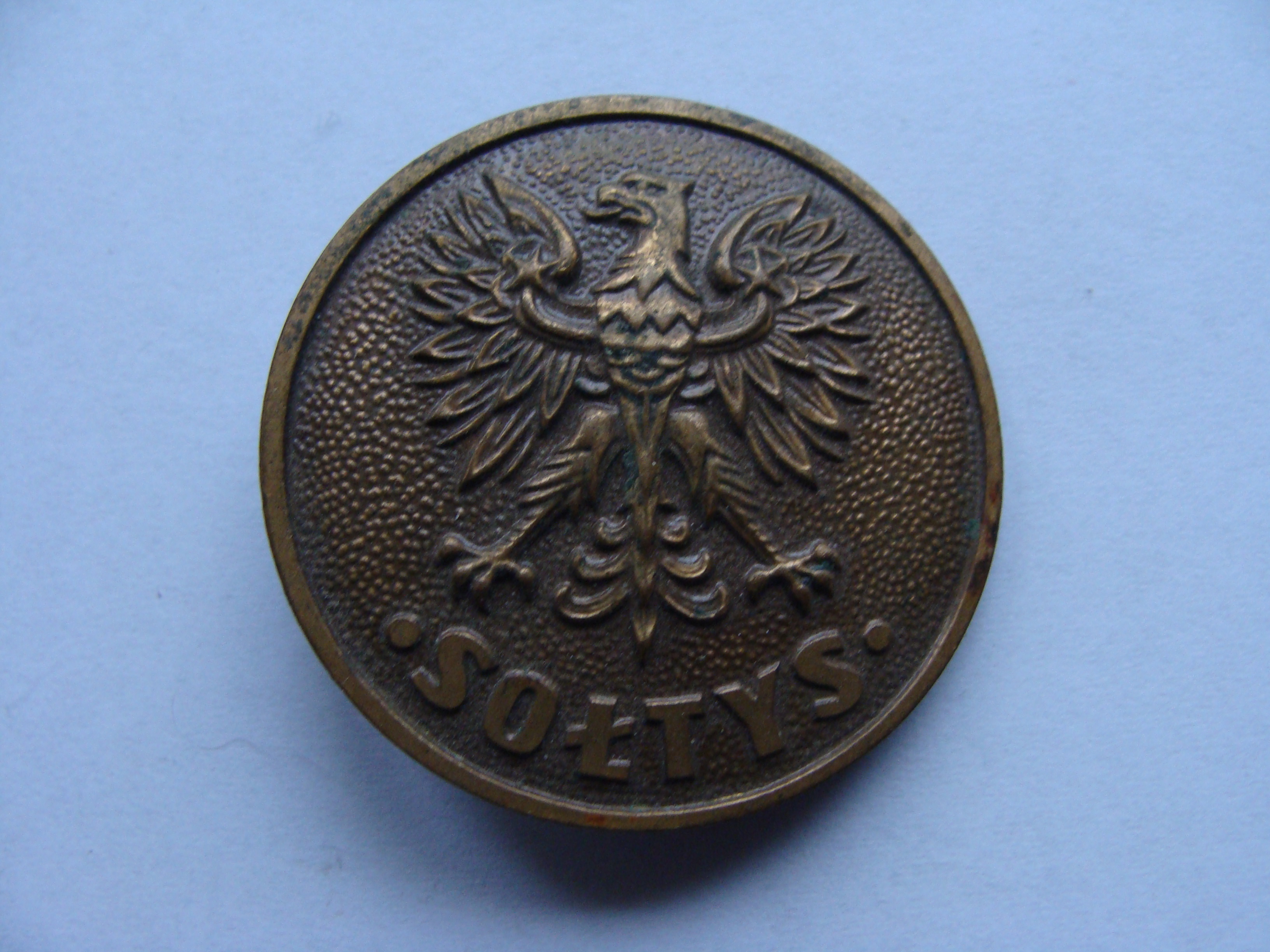 Moneta z napisem Sołtys